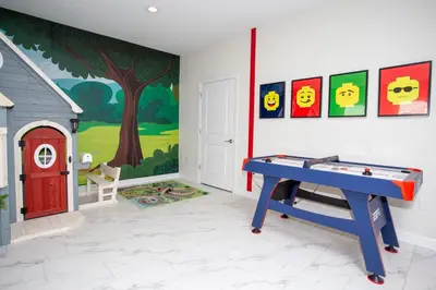 a room with a play table and a play house at 4577 Stunning 7 bedroom home in Kissimmee