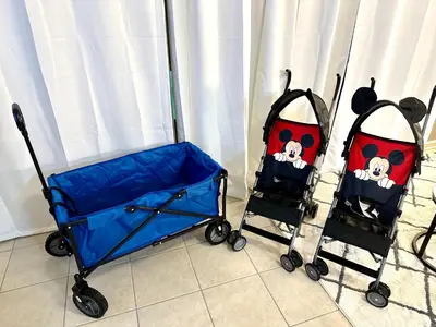 two baby strollers sitting next to each other at Townhome near Disney with pool Magic and Fun at Windsor in Orlando