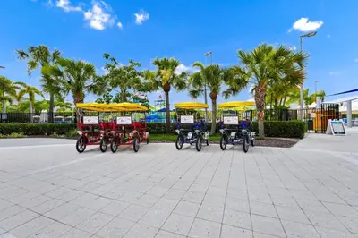 a group of four bikes parked in a parking lot at Delightful Home Near Disney With Private Pool, Themed & Game Room With Waterpark & Resort Access At Encore Resorts Reunion - 451No in Kissimmee
