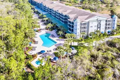 an aerial view of a resort with a swimming pool at Near Disney - 3BR Condo - Pool and Games in Orlando