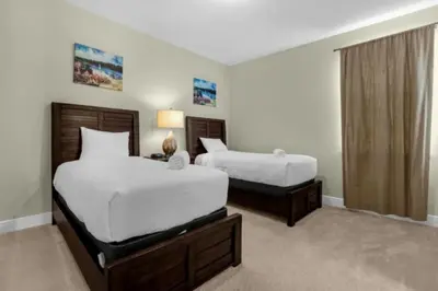 a bedroom with two beds and a window at Multiple Family Homes - 23 Rooms PoolsSpas in Orlando