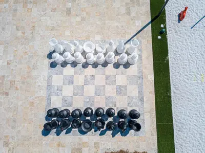 a chess set on a chess board at Modern and Luxury 4 suites close to Disney 7544 in Orlando