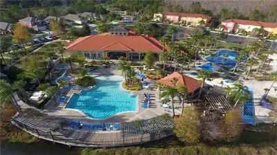 an aerial view of a pool at a resort at Cozy Private Home at Terra Verde Resort, South Facing Pool Spa, Near Disney, SeaWorld in Kissimmee