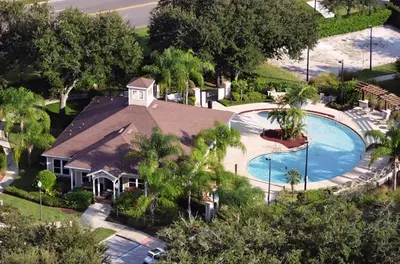 an aerial view of a house with a swimming pool at 43 Townhouse Near Disney!! in Kissimmee