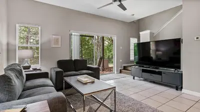 a living room with a large flat screen tv at bsv_villa8445 in Kissimmee