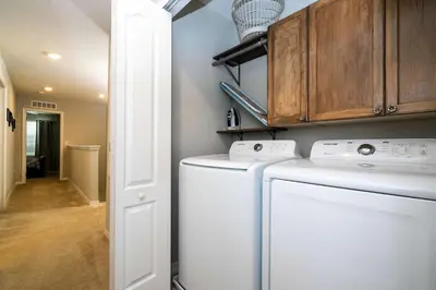 a laundry room with a washer and dryer at Stunning 3Bd Close to Disney at Fiesta Key 4764 in Kissimmee