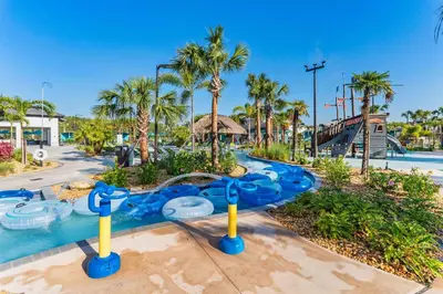 a pool at a resort with a water park at 4423 Scene Lane in Kissimmee