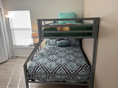 a bunk bed in a room with a bunk bedouble at Emerald Escape - New Pool Home in Kissimmee