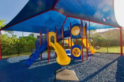 a playground with a slide and a slideintend at Vista Cay Luxury 3BR Condo in Orlando