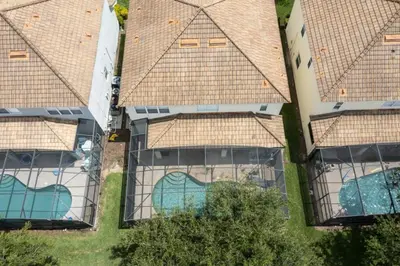 an overhead view of a house with a swimming pool at Windsor Oasis 6BR Pool Game Room 9 min Disney in Orlando