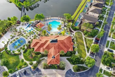 an overhead view of a pool at a resort at Comfort Home with BBQ, Private Pool & Hot tub in Kissimmee