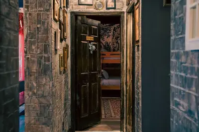 a hallway with a door leading to a bedroom at Stay at Hogwarts Harry Potter's Home, Free Parking, Pets Allowed in Kissimmee