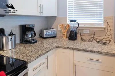 a kitchen with a counter top with a blender at Themed Home Near Disney World in Kissimmee
