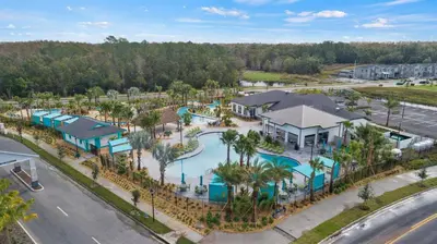 an aerial view of a pool at a resort at 2718 Oxymoron in Kissimmee