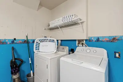a laundry room with a washer and dryer at 2605 Pawnall in Kissimmee