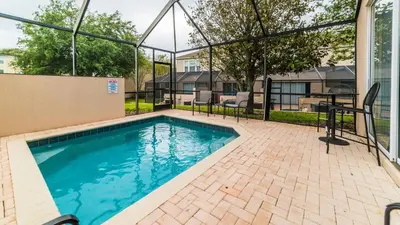 a swimming pool in the middle of a building at 8114 Princess Palm in Kissimmee