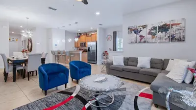 a living room with a couch and a table at 8949 Candy Palm in Kissimmee