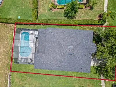 an aerial view of a house with a roof at Be-Our-Guest Home! 15 mins to Disney! in Kissimmee
