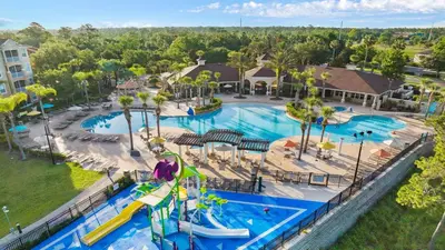 an overhead view of a pool at a resort at 6BR Private Pool, Spa, Gameroom, Close to Disney in Orlando
