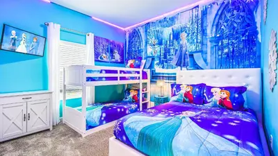 a bedroom with a disney themed bedroom with a bunk bed at Storey Lake 5br Family Townhome w Pool Near Disney in Kissimmee
