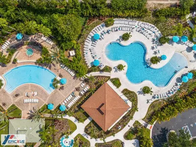 an overhead view of a pool at a resort at The Epic London Vista Cay Orlando Next to the club in Orlando