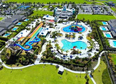 an aerial view of a water park at a resort at Elegant Home With Private Pool, Waterpark & Resort Access Near Disney At Encore Resort - 7610Wi in Kissimmee