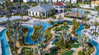 an aerial view of a resort with pools and golf courses at Themed Rooms & Pool in Storey Lake Resort in Kissimmee
