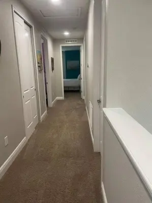 an empty hallway with a hallwayngthngthngthngthngthngthngthngthngthngth at Luxury 6 BR 6 Bath @Encore Resort Pool Spa Grill. in Orlando