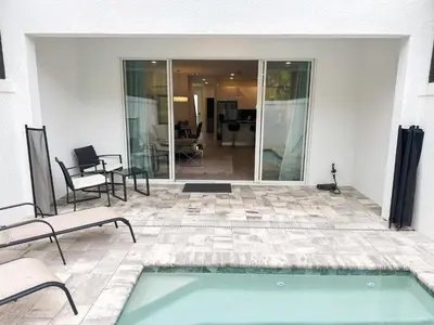 a swimming pool in the middle of a building at 3 bedrooms pool home Hidden Forest Resort Amenities in Orlando