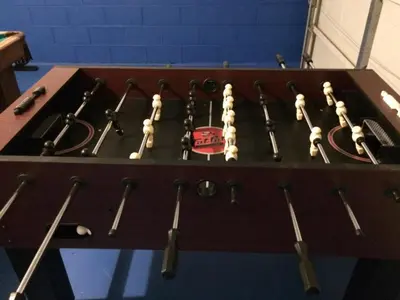 a wooden table with a bunch of tools on it at Christine's Villa in Kissimmee