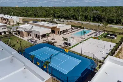 an aerial view of a tennis court at a resort at Elegant Home w 3 En Suites & Breathtaking View in Orlando