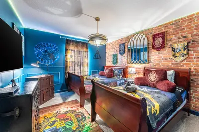 a room with a bed and a brick wall at Family Retreat near Disney with Pool & Hot Tub! in Kissimmee