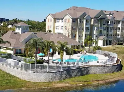an aerial view of a resort with a swimming pool at Comfortable Apartment, Close to Disney World in Kissimmee