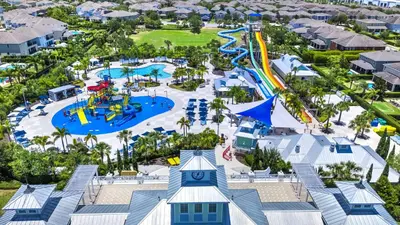 an aerial view of the splash park at the resort at Lively Home Near Disney With Private Pool, Game And Themed Rooms With Waterpark & Resort Access At Encore Resorts Reunion - 670La in Kissimmee