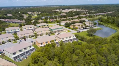 an aerial view of a resort with a large building at Serene Villa with Private Pool in Orlando