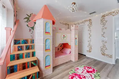 a room with a castle themed bedroom with a bunk bed at 5BR Themed Pool Home Near Disney World in Kissimmee