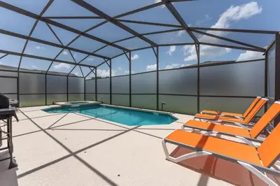 an image of a swimming pool in a tent at 5BR Themed Pool Home Near Disney World in Kissimmee