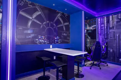 a purple room with a table and chairs in it at Storey Lake House 2713 in Kissimmee