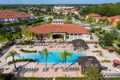 an aerial view of a pool at a resort at Remodeled Gem - Comfort & Location in Kissimmee