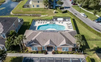 an aerial view of a house with a swimming pool at Modern Luxury Retreat - Mickey & Harry Potter Beds in Orlando