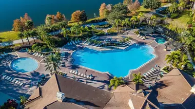 an aerial view of a resort with two swimming pools at Prime Location-Spacious Condo for 8 Guests in Orlando