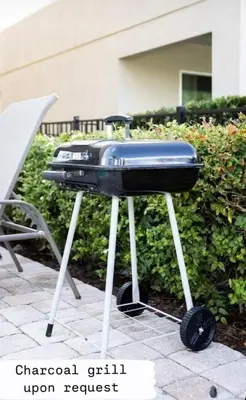 a bbq grill sitting on top of a table at 351-AFV · 351 hiden retreat 6bepoolgameroom in Orlando