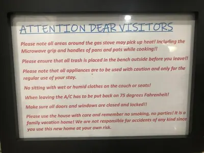 a sign that says attention derriskers on a document at NEW awesome dream house, 5 Min to Disney in Orlando