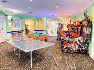 a games room with a ping pong table and a pool at Windsor Palms, next to clubhouse in Kissimmee