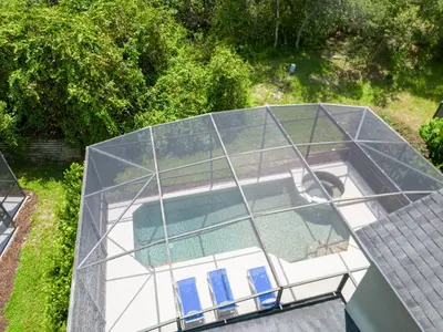 an overhead view of a house with a glass roof at Great 6bedrooms home in Kissimmee w Private Pool 8426 in Kissimmee