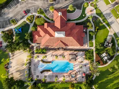 an overhead view of a resort with a swimming pool at Upstay Ultimate Orlando Retreat w Pool & Hot Tub Sleeps 16 in Kissimmee