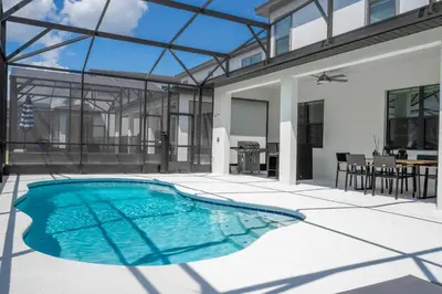 an image of a swimming pool in a house at Brand New Top Elegance Home at Paradiso 6086 in Orlando