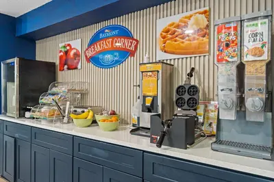 a kitchen with a counter top with at Baymont by Wyndham Orlando Downtown in Orlando