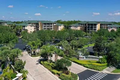an aerial view of a resort with a parking lot at Caribe Cove Resort 3BR Condo Apt Disney Orlando in Kissimmee
