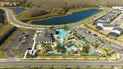 an aerial view of a resort with a pool at Magnificient 4Bd w Pool @ Storey Lake Resort 2648 in Kissimmee